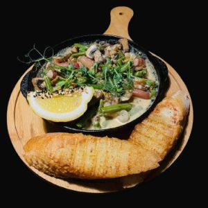 Морепродукти у вершковому соусі
