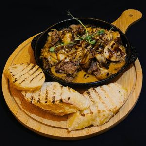 Яловичина з грибами